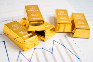 Gold bars placed on a financial chart illustrating the rapid growth of Tanzania’s gold exports and rising bilateral trade with South Africa.